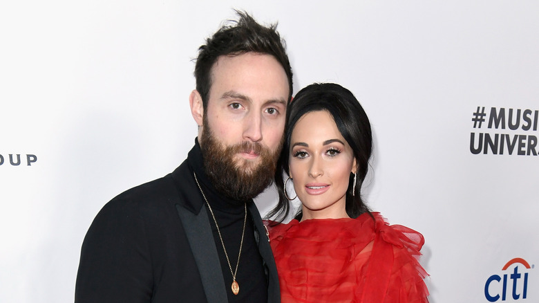 Ruston Kelly and Kacey Musgraves posing