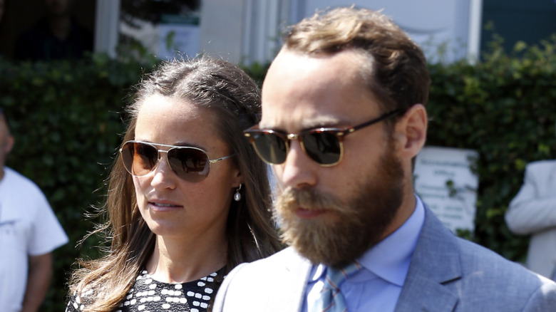 James and Pippa Middleton walking at Wimbledon