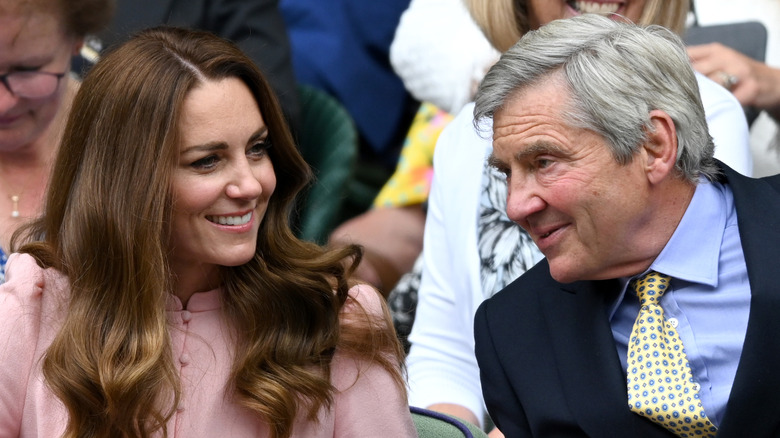 Michael Middleton smiling next to daughter Kate Middleson.