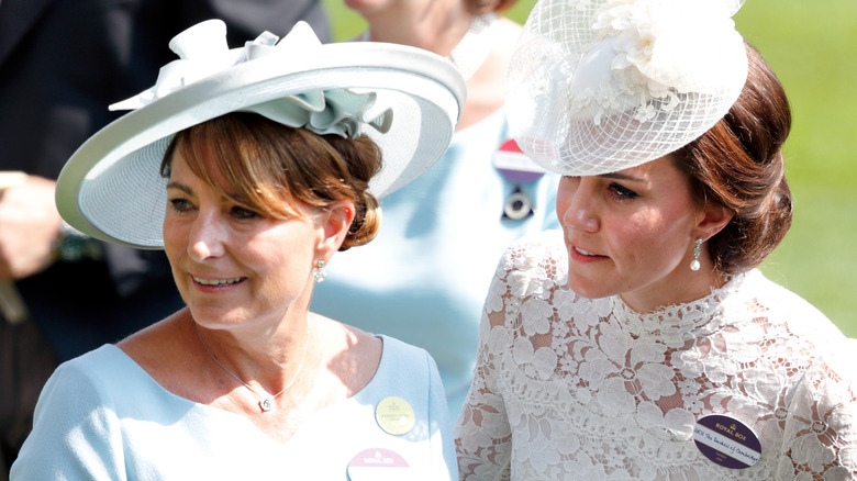 Carole Middleton and Princess Catherine wearing fascinators