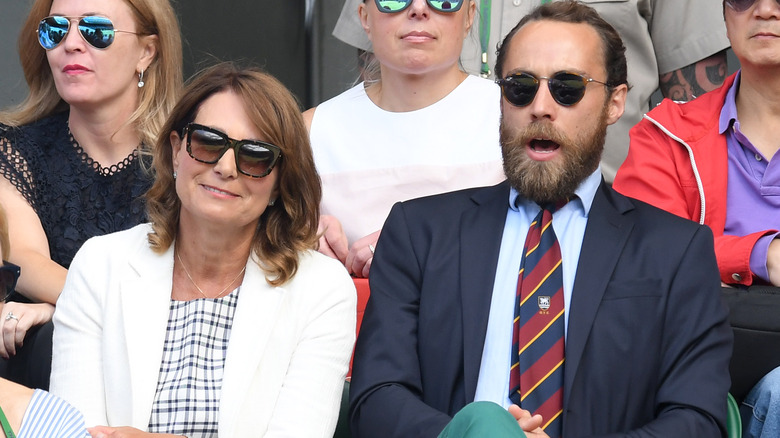 Carole and James Middleton in bleachers