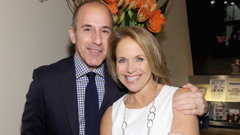 Matt Lauer and Katie Couric smiling