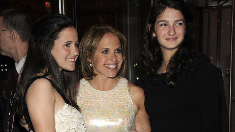 Katie Couric and her daughters posing 