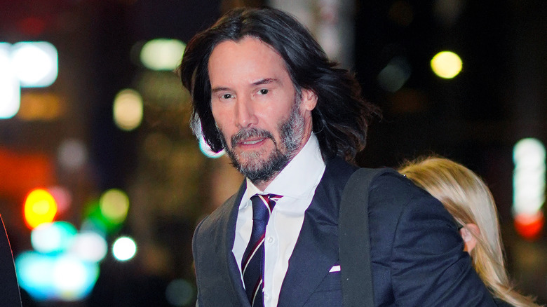 Keanu Reeves wearing a suit in New York City