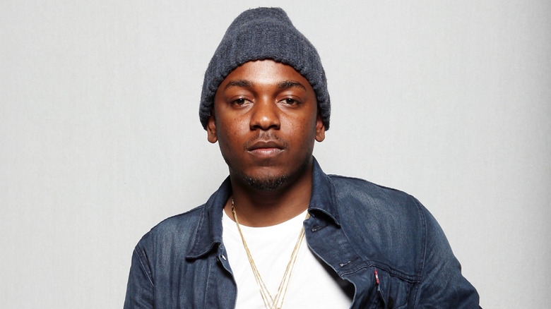 Kendrick Lamar posing backstage at SXSW