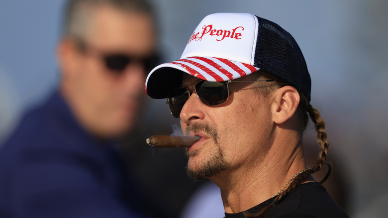 Kid Rock smoking a cigar