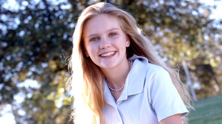 Kirsten Dunst as a child smiling