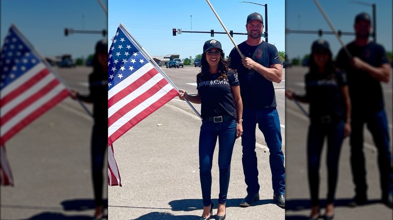 Lauren and Jayson Boebert waving flags