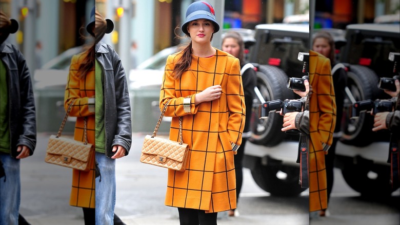 Leighton Meester in yellow windowpane coat and blue hat on set of Gossip Girl