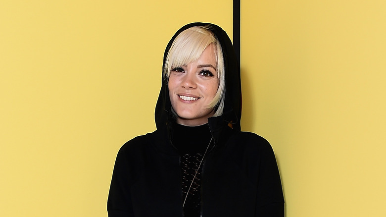 Lily Allen wearing black hoodie