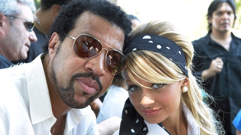 Lionel and Nicole Richie at an awards show together