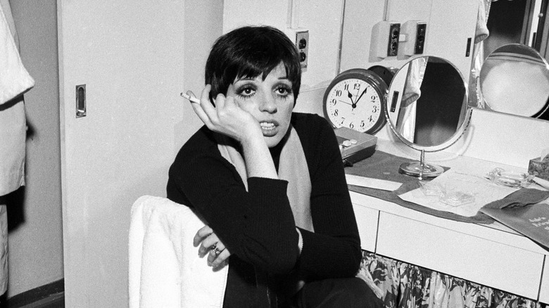 Liza Minnelli with cigarette in a dressing room