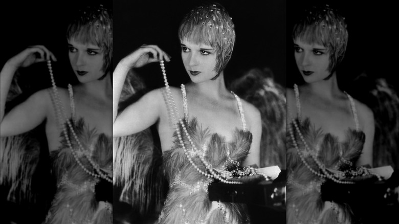 Louise Brooks in costume with pearls