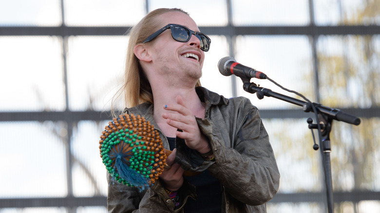 Macaulay Culkin performing with Pizza Underground