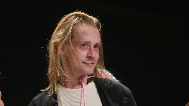 Macaulay Culkin with long hair