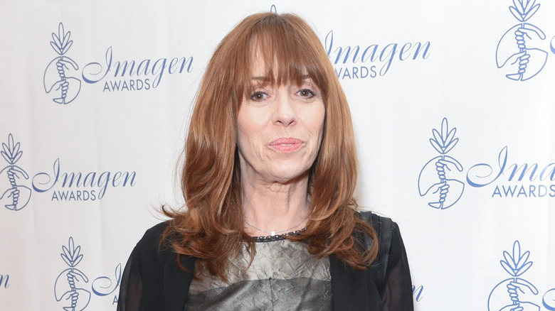 Mackenzie Phillips looking introspective