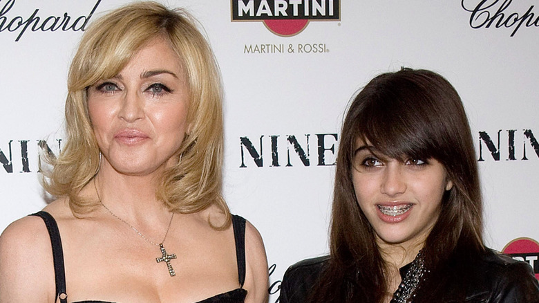 Madonna and daughter Lourdes Leon smiling at New York Premiere of NINE at The Ziegfeld Theatre in New York in December 2009