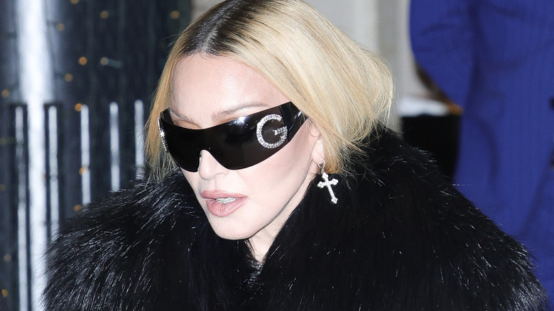 Madonna wearing oversized sunglasses