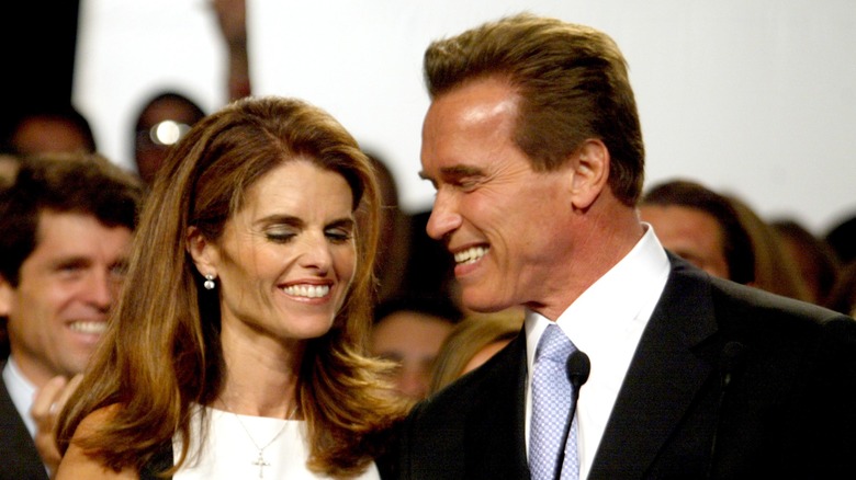 Maria Shriver smiling with Arnold Schwarzenegger