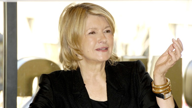 Martha Stewart in a black suit at an in store appearance to promote her new book 'Martha Stewart's Cooking School'