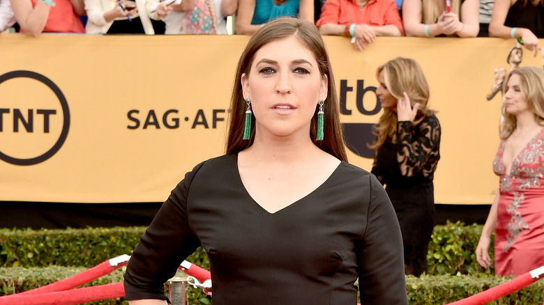 Mayim Bialik posing in black