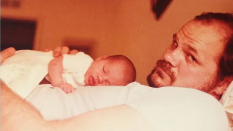 Thomas Markle holding baby Meghan 