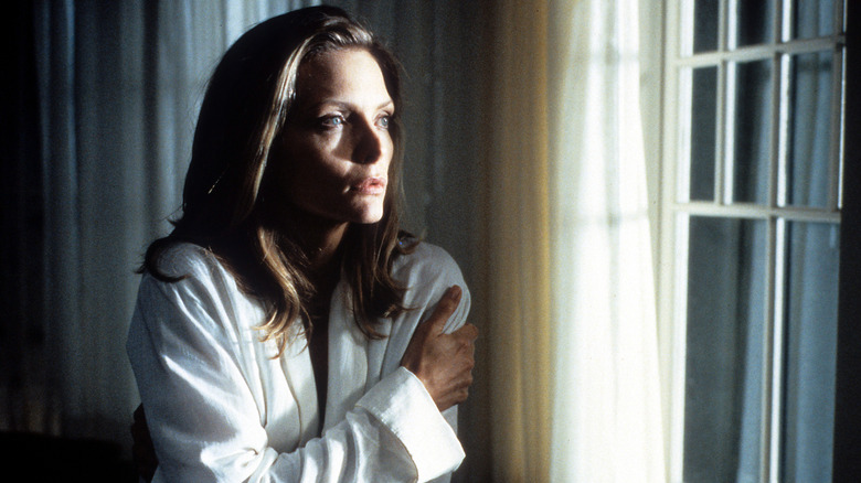 Michelle Pfeiffer by the window in What Lies Beneath