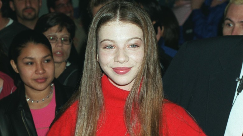 Michelle Trachtenberg smiling at a Buffy event