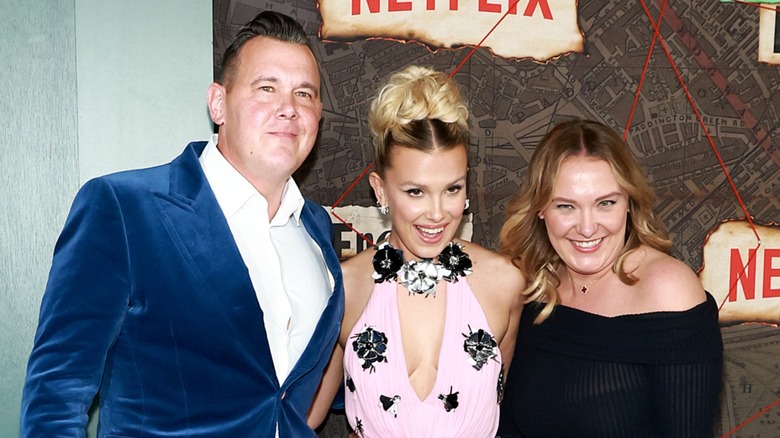 Millie Bobby Brown with her dad and sister