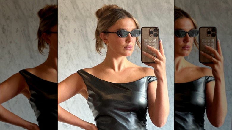 Millie Bobby Brown taking a mirror selfie