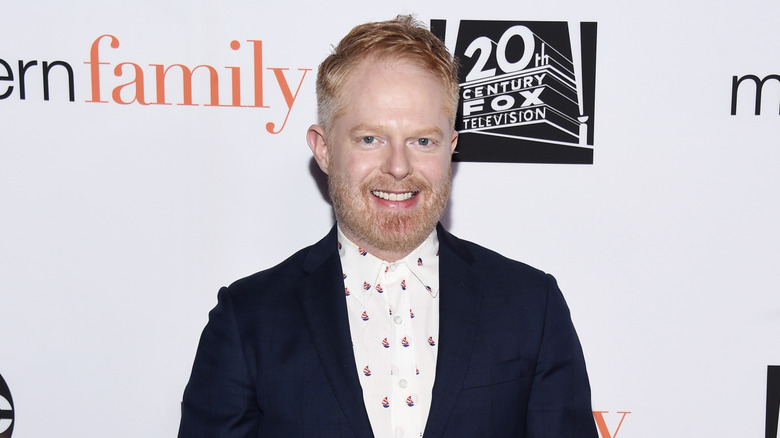 Jesse Tyler Ferguson smiles at camera