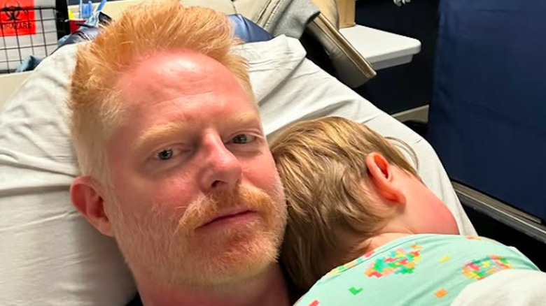 Jesse Tyler Ferguson and his son lay in a hospital bed