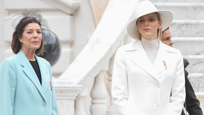 Princess Caroline, Princess Charlene standing together