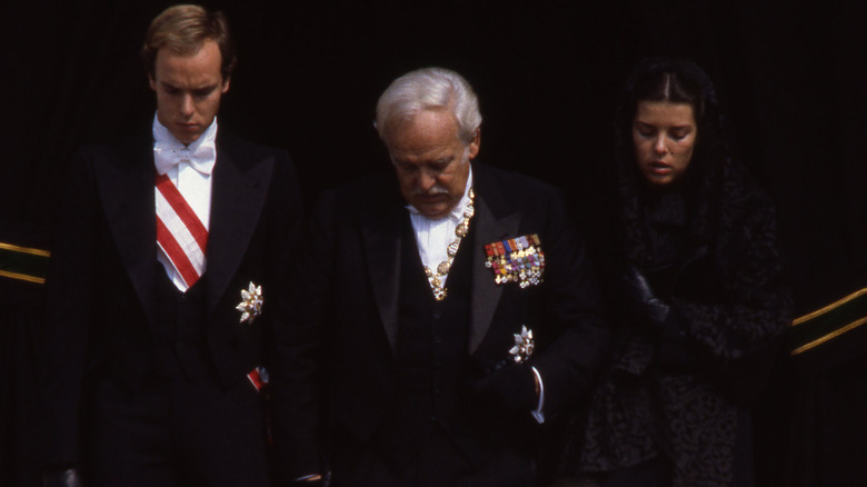 Prince Albert II, Prince Rainier III, Princess Caroline, at Princess Grace's funeral 