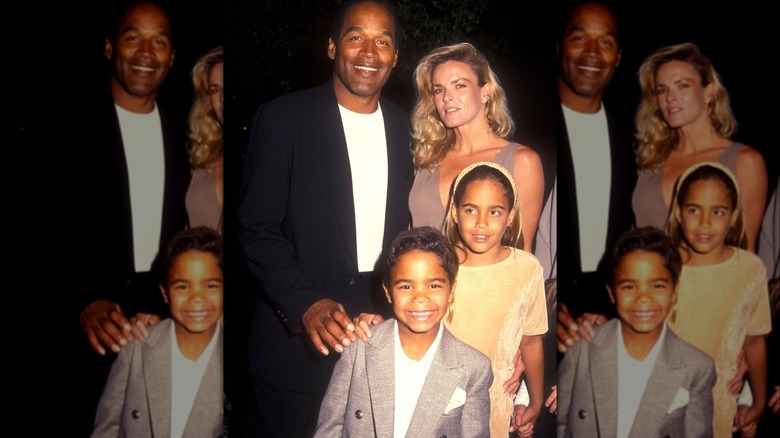 Nicole and O.J. Simpson posing with their kids