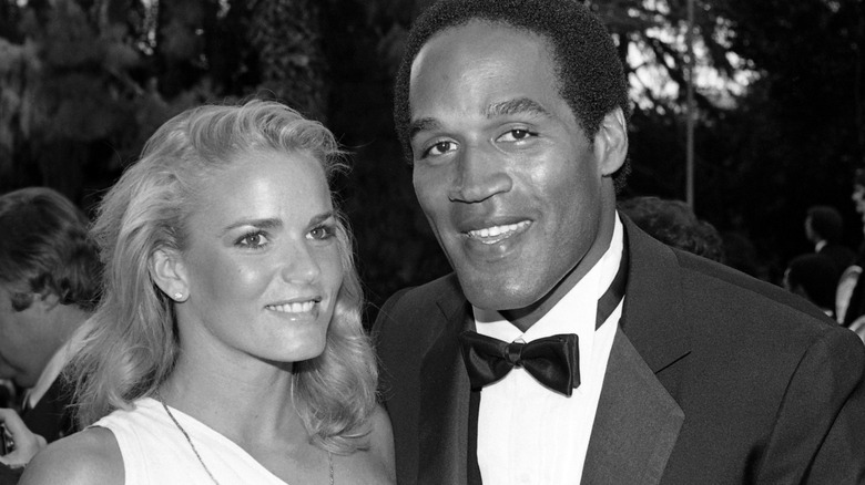 Nicole Brown Simpson and O.J. Simpson smiling 