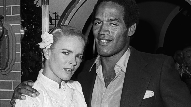 Nicole Brown Simpson and O.J Simpson smiling 