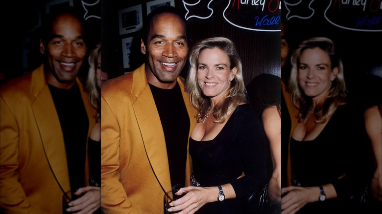 Nicole Brown Simpson and O.J. Simpson smiling 