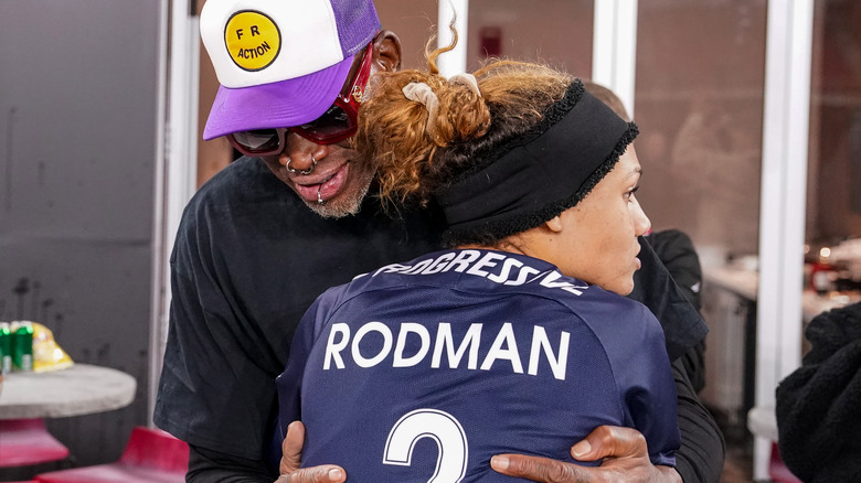 Dennis Rodman hugging Trinity Rodman