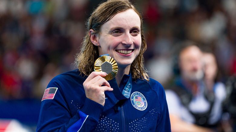 Katie Ledecky showing off a gold medal