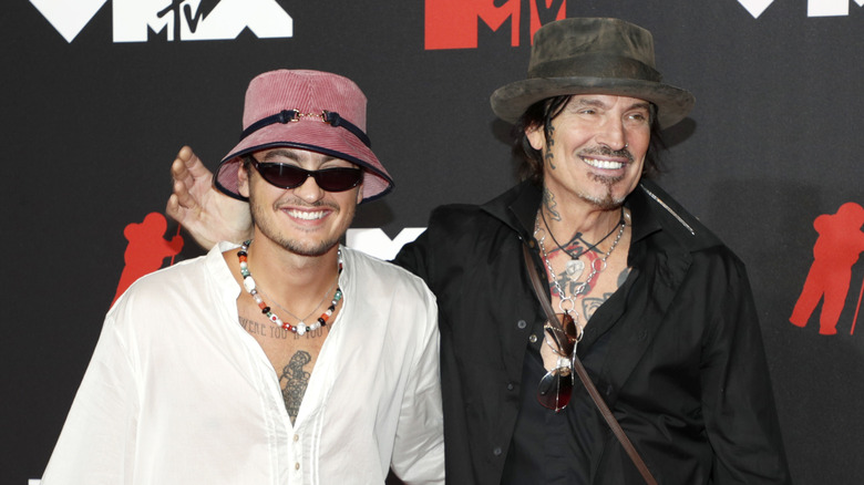 Brandon Thomas Lee and Tommy Lee smiling