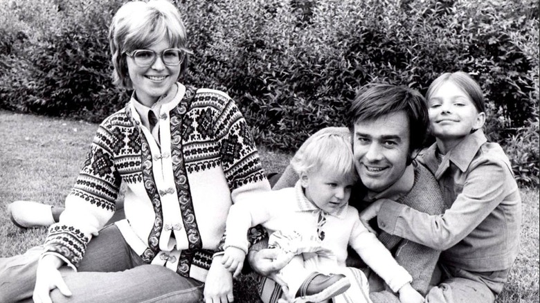 Paulina Porizkova posing with her family