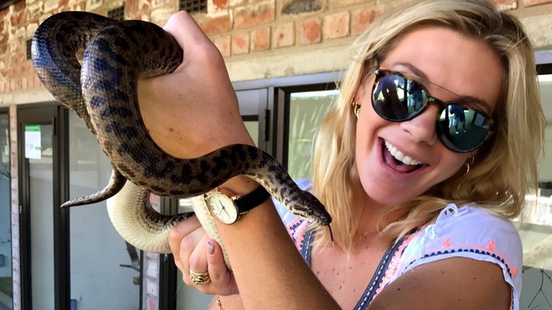 Chelsy Davy with a snake