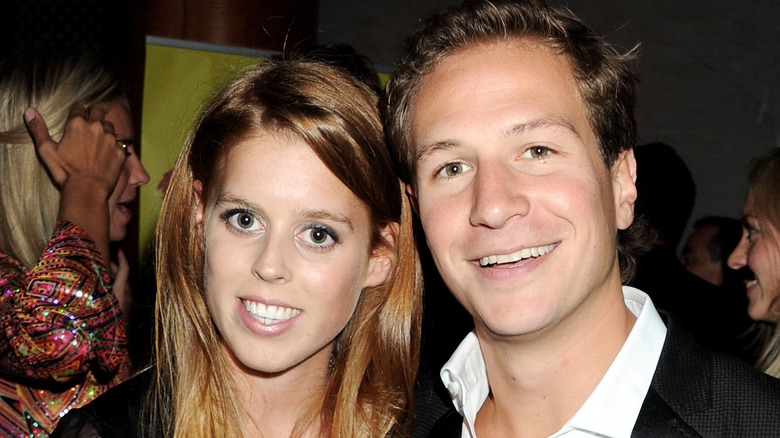 Princess Beatrice smiling with Dave Clark