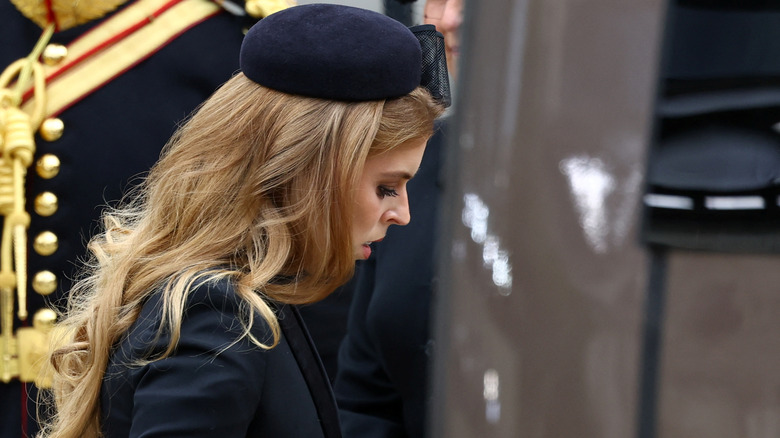 Princess Beatrice looking downward