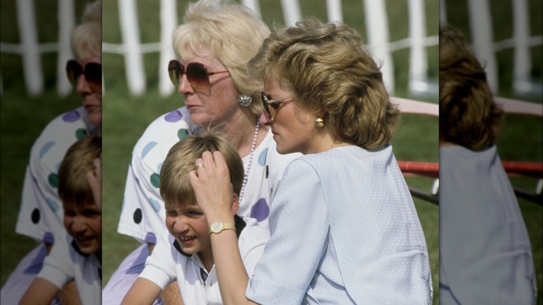 Princess Diana sitting with her mother and Prince William