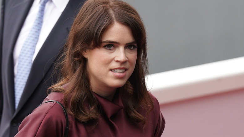 Princess Eugenie walking and smiling 