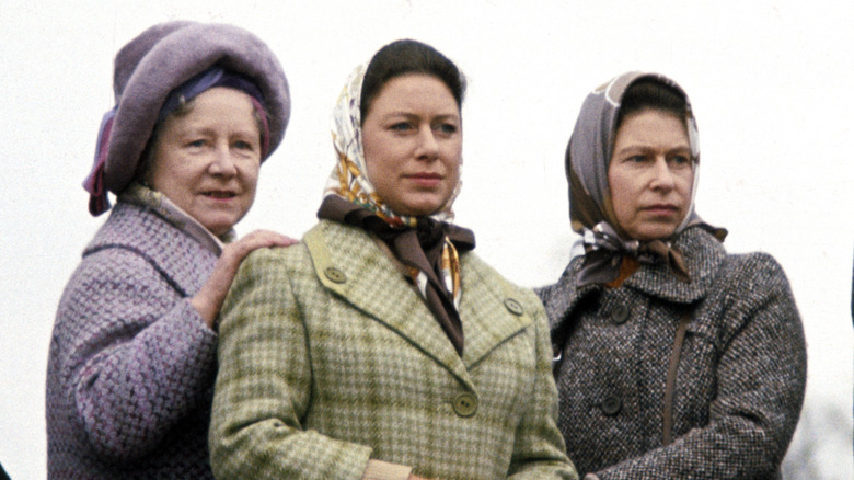 Princess Margaret standing with her mother and sister