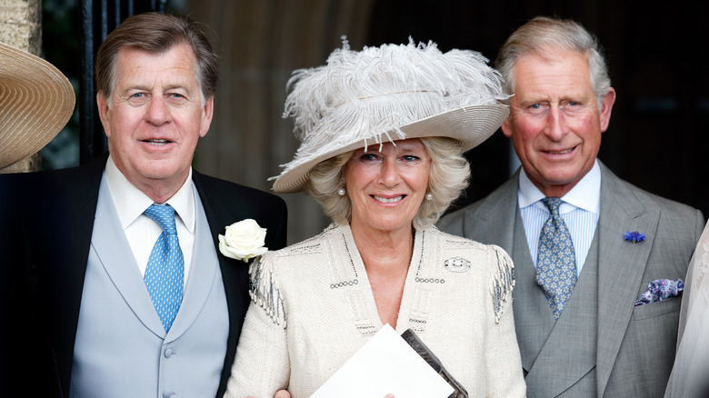 Simon Elliot next to Camilla and Charles