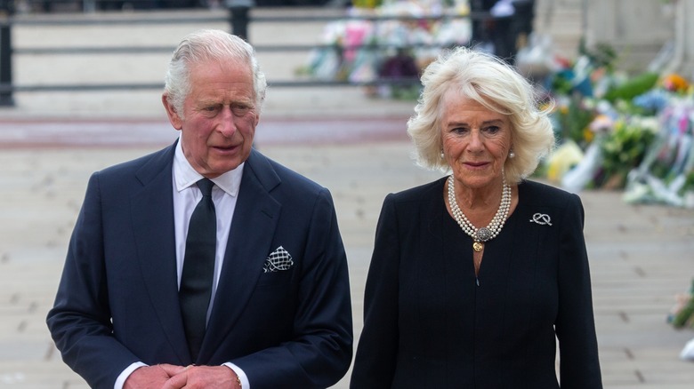 Charles walking with Camilla